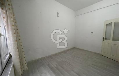 Bayraklı Mansuroğlu’nda 1+1 Bahçeli Kiralık Daire