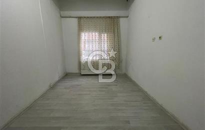 Bayraklı Mansuroğlu’nda 1+1 Bahçeli Kiralık Daire
