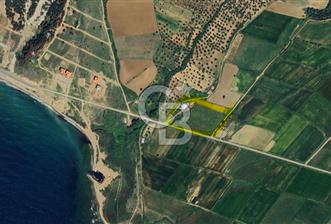 gökçeeada anayol üzeinde imara yakın satılık arazi