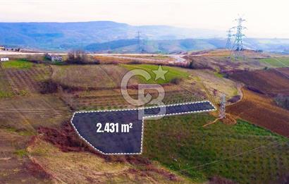 CB AKADEMİ TOPLUCA KANDIRA YOLU KENARINDA SATILIK 2431 m2 TARLA