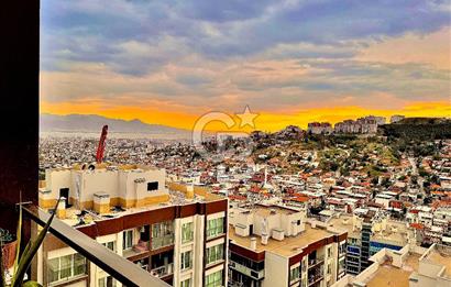 Bayraklı Yamanlar’da Deniz Manzaralı, Güvenlikli Sitede 3+1 Ferah Daire
