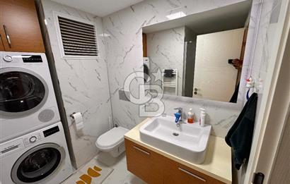 Bayraklı Yamanlar’da Deniz Manzaralı, Güvenlikli Sitede 3+1 Ferah Daire