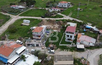ALİAĞA ÇALTILIDERE'DE KÖY İÇERİSİNDE (250M2) SATILIK İMARLI ARSA