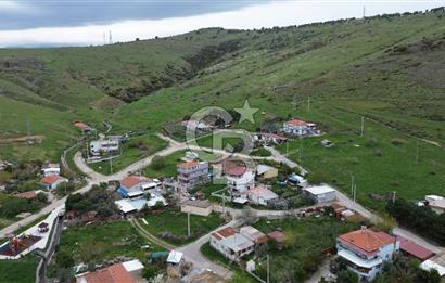 ALİAĞA ÇALTILIDERE'DE KÖY İÇERİSİNDE (250M2) SATILIK İMARLI ARSA