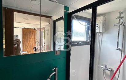 DATÇA HIZIRŞAHTA İÇİNDE TINYHOUSE OLAN MEYVE BAHÇESİ YOLU OLAN 
