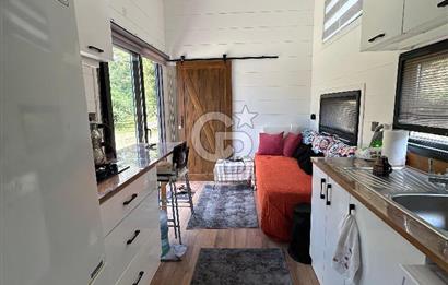 DATÇA HIZIRŞAHTA İÇİNDE TINYHOUSE OLAN MEYVE BAHÇESİ YOLU OLAN 