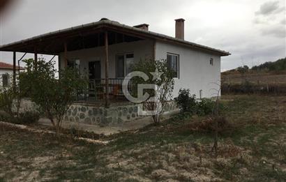 GÜDÜL GÜNEYCEDE TEK TAPU 2 ADET EV VE SATILIK TARLA