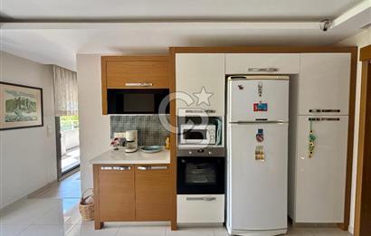 Güzelbahçe Maltepe mah 3+1 145 m2 Net havuzlu otopaeklı bahce katı daire