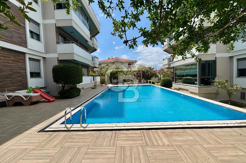 Güzelbahçe Maltepe mah 3+1 145 m2 Net havuzlu otopaeklı bahce katı daire