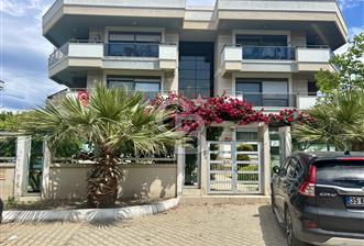 Güzelbahçe Maltepe mah 3+1 145 m2 Net havuzlu otopaeklı bahce katı daire