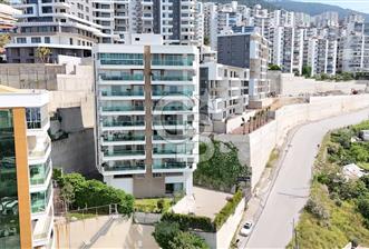 NARLIDERE'DE HARİKA KONUMDA DENİZ MANZARALI SATILIK 3+1 132 M2 NET DAİRE