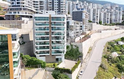 NARLIDERE'DE HARİKA KONUMDA DENİZ MANZARALI SATILIK 3+1 132 M2 NET DAİRE
