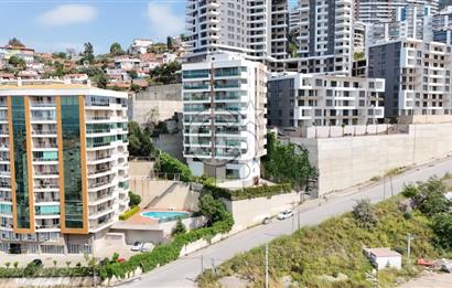 NARLIDERE'DE HARİKA KONUMDA DENİZ MANZARALI SATILIK 3+1 132 M2 NET DAİRE
