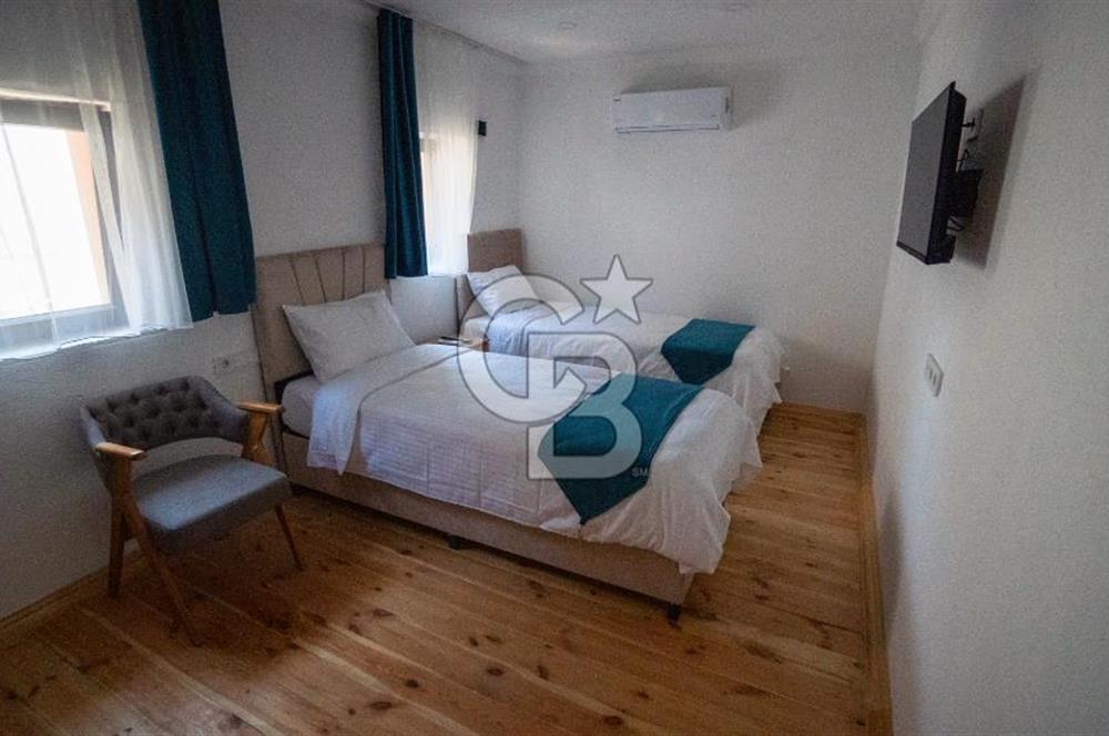 Ayvalık'ta,Eşsiz bir konumda, Denize sıfır,Satılık Emsalsiz Mülk