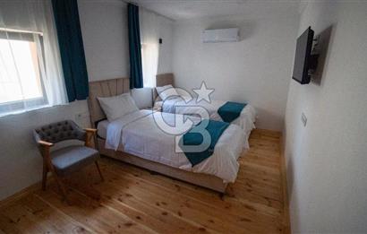 Ayvalık'ta,Eşsiz bir konumda, Denize sıfır,Satılık Emsalsiz Mülk