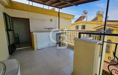 Kuşadası Karaova havuzlu sitede eşyasız kiralık triplex villa