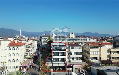 AKÇAY KORDON'DA PANORAMİK DENİZ MANZARALI  ÖZEL TASARIM GENİŞ 1+1 DAİRE