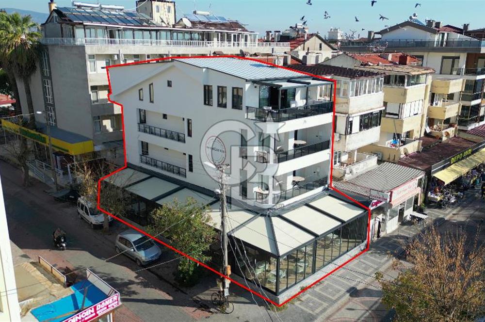 AKÇAY KORDON'DA PANORAMİK DENİZ MANZARALI  ÖZEL TASARIM GENİŞ 1+1 DAİRE