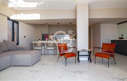 AKÇAY KORDON'DA PANORAMİK DENİZ MANZARALI  ÖZEL TASARIM GENİŞ 1+1 DAİRE