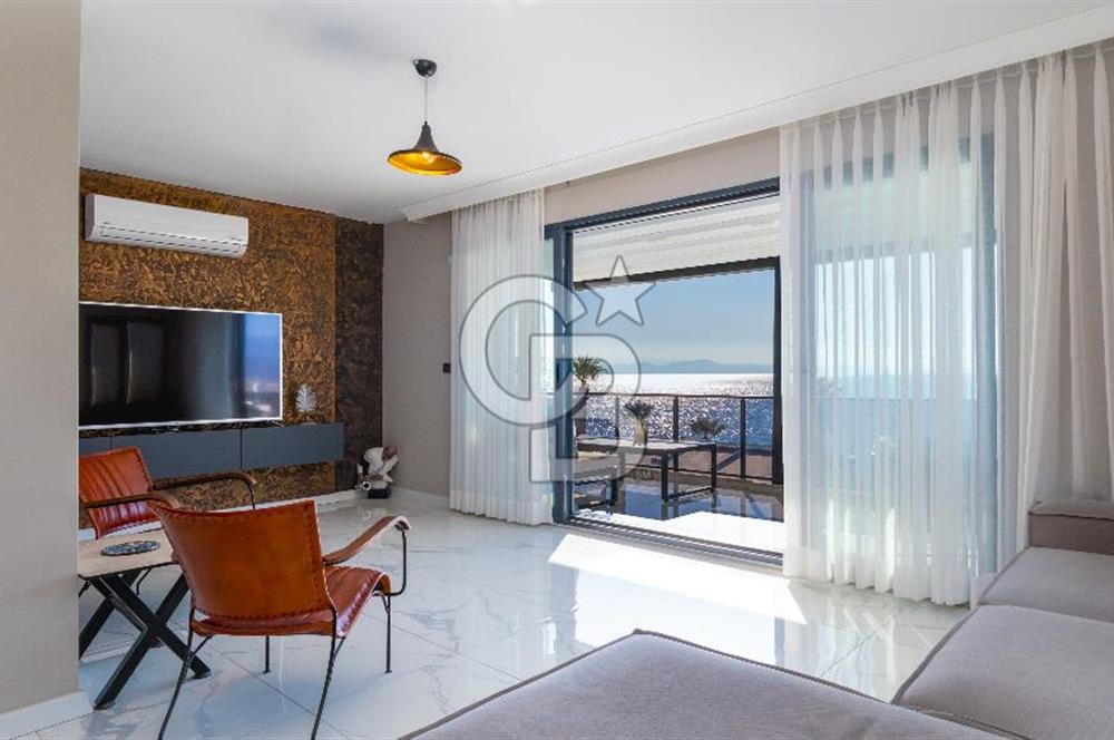 AKÇAY KORDON'DA PANORAMİK DENİZ MANZARALI  ÖZEL TASARIM GENİŞ 1+1 DAİRE