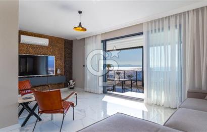 AKÇAY KORDON'DA PANORAMİK DENİZ MANZARALI  ÖZEL TASARIM GENİŞ 1+1 DAİRE