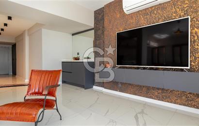 AKÇAY KORDON'DA PANORAMİK DENİZ MANZARALI  ÖZEL TASARIM GENİŞ 1+1 DAİRE