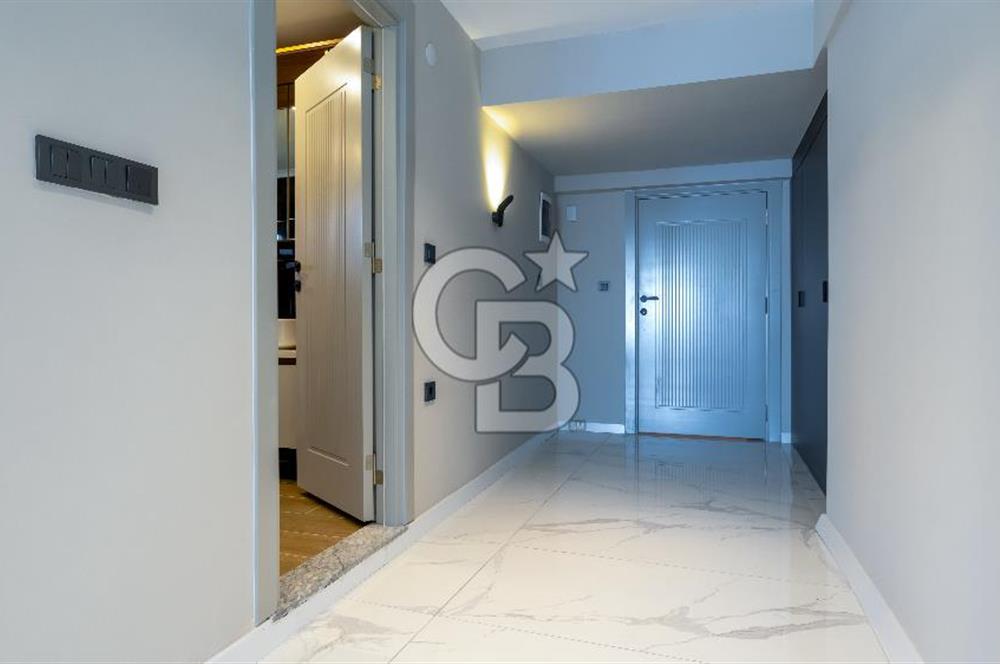 AKÇAY KORDON'DA PANORAMİK DENİZ MANZARALI  ÖZEL TASARIM GENİŞ 1+1 DAİRE