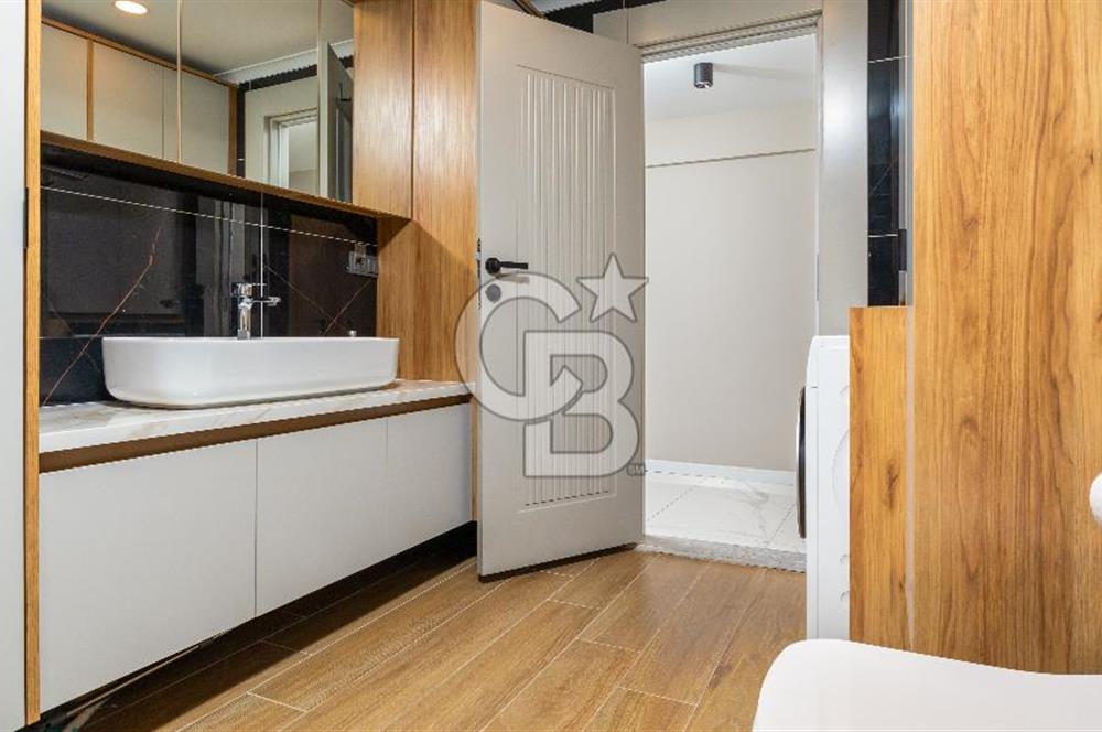 AKÇAY KORDON'DA PANORAMİK DENİZ MANZARALI  ÖZEL TASARIM GENİŞ 1+1 DAİRE