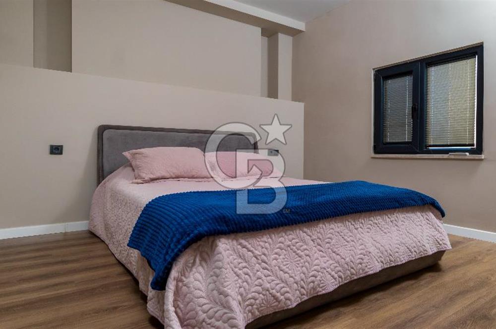 AKÇAY KORDON'DA PANORAMİK DENİZ MANZARALI  ÖZEL TASARIM GENİŞ 1+1 DAİRE