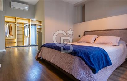 AKÇAY KORDON'DA PANORAMİK DENİZ MANZARALI  ÖZEL TASARIM GENİŞ 1+1 DAİRE