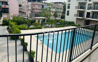 BORNOVA İKON CADDE PROJESİNDE 2+1 HAVUZ CEPHELİ SATILIK DAİRE