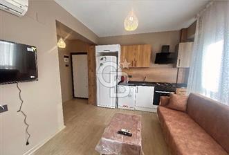 Çınarlı'da Yeni Eşyalı 1+1 Kiralık Daire