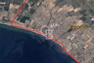DİKİLİ GÜLKENT SİTESİNDE DENİZE YAKIN MESAFEDE VİLLA İMARLI FIRSAT ARSA
