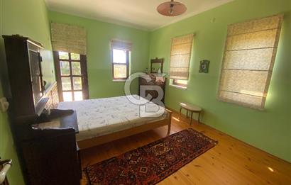 BOZCAADA PAPAZBAHÇE'DE 2.5 DÖNÜM BAHÇE İÇİNDE SATILIK BAĞ EVİ