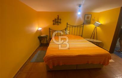 BOZCAADA PAPAZBAHÇE'DE 2.5 DÖNÜM BAHÇE İÇİNDE SATILIK BAĞ EVİ