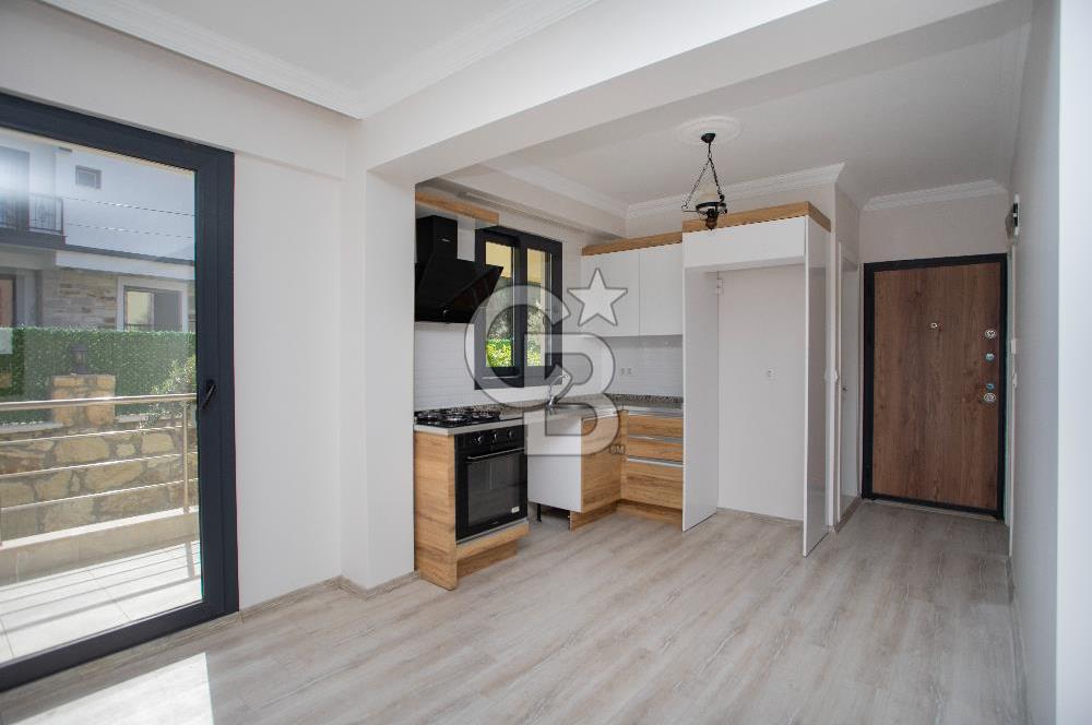 Foça Kazım Dirik Mah. Kiralık 1+1 Bahçe Katı Daire