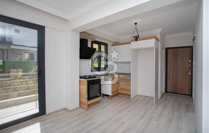 Foça Kazım Dirik Mah. Kiralık 1+1 Bahçe Katı Daire