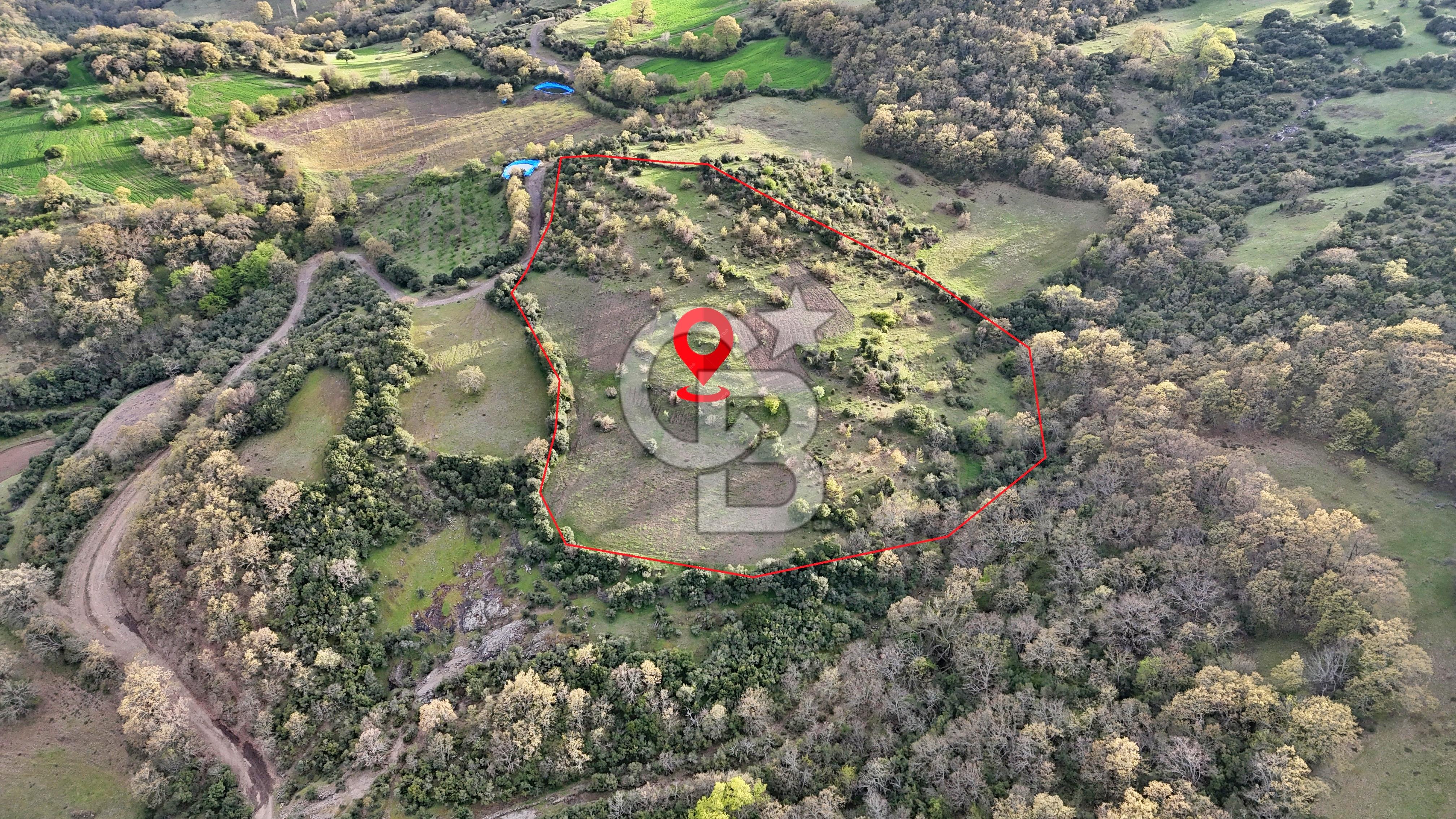 LAPSEKİDE DOĞA İLE İÇ İÇE RESMİ YOLU OLAN 15329 M² ARAZİ