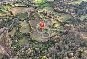 LAPSEKİDE DOĞA İLE İÇ İÇE RESMİ YOLU OLAN 15329 M² ARAZİ