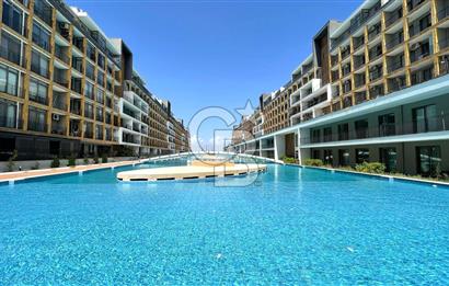 İZMİR'İN EN BÜYÜK HAVUZLU PROJESİNDE GENİŞ TİP 2+1 SATILIK DAİRE