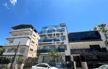 Bayraklı Merkezde Satılık Komple Bina Teraslı Deniz Manzaralı