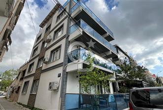Bayraklı Merkezde Satılık Komple Bina Teraslı Deniz Manzaralı