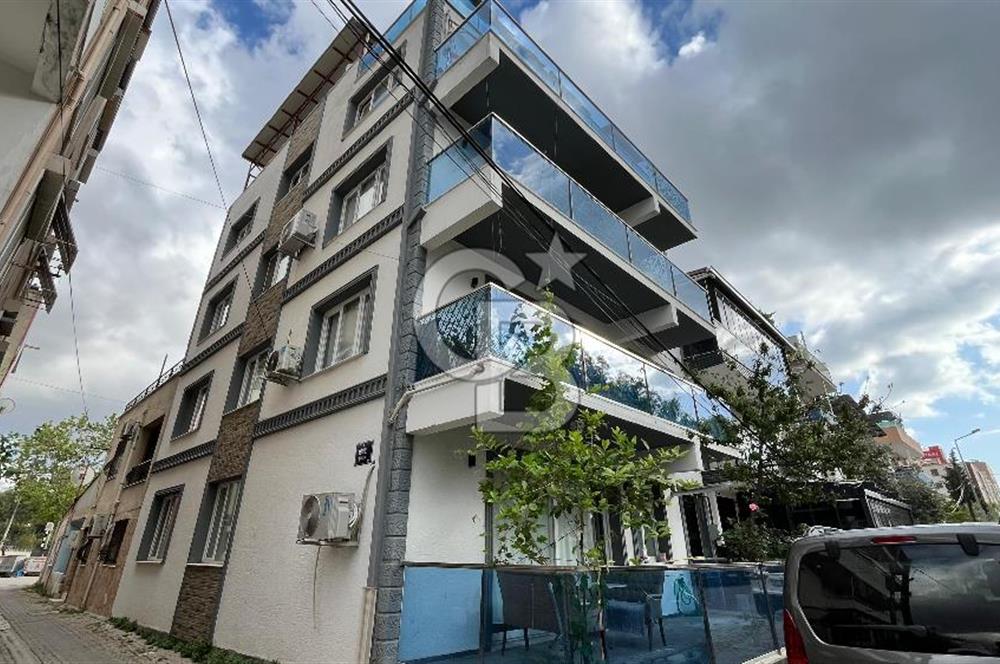 Bayraklı Merkezde Satılık Komple Bina Teraslı Deniz Manzaralı