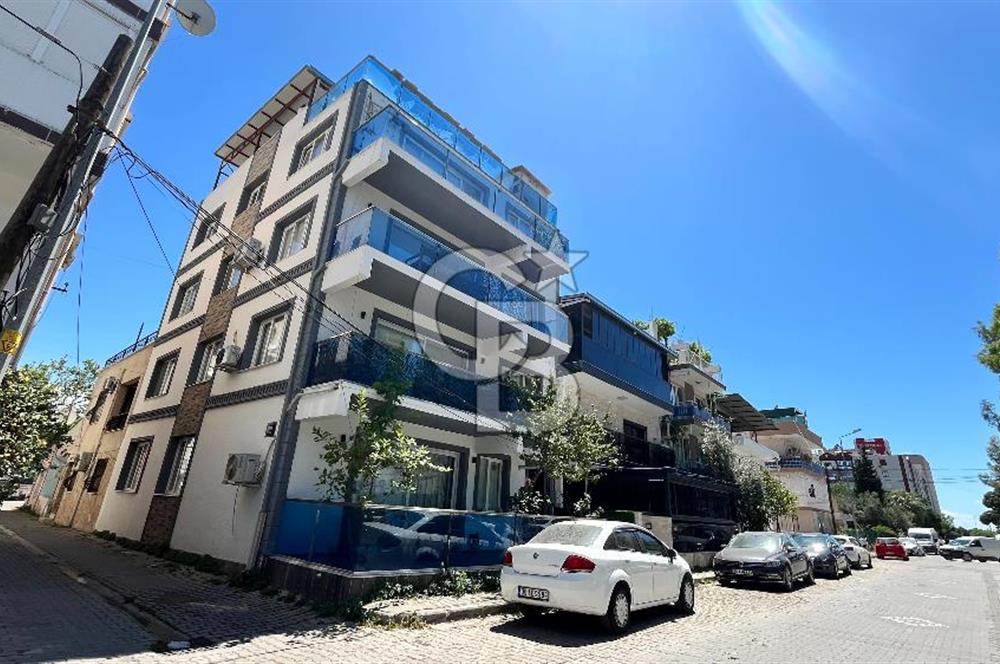 Bayraklı Merkezde Satılık Komple Bina Teraslı Deniz Manzaralı