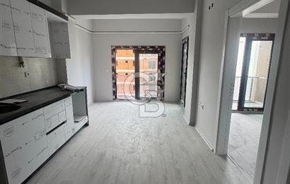 SEYREK MERKEZ'DE KONUMDA 1+1 SATILIK DAİRE