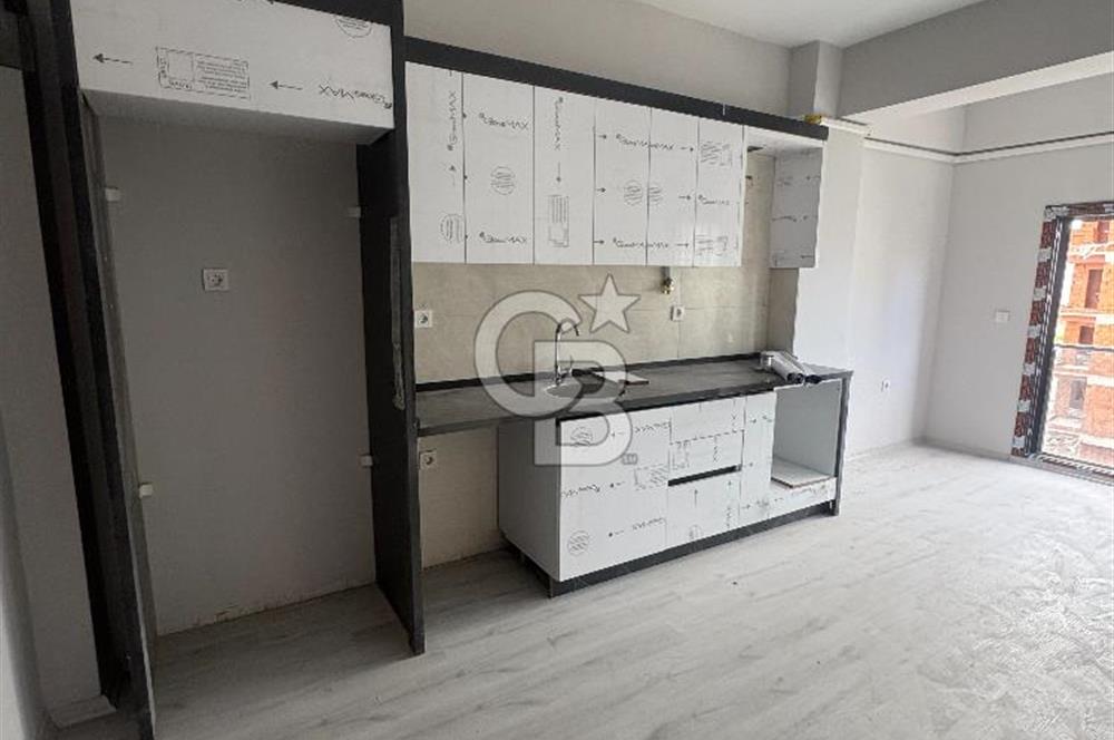 SEYREK MERKEZ'DE KONUMDA 1+1 SATILIK DAİRE