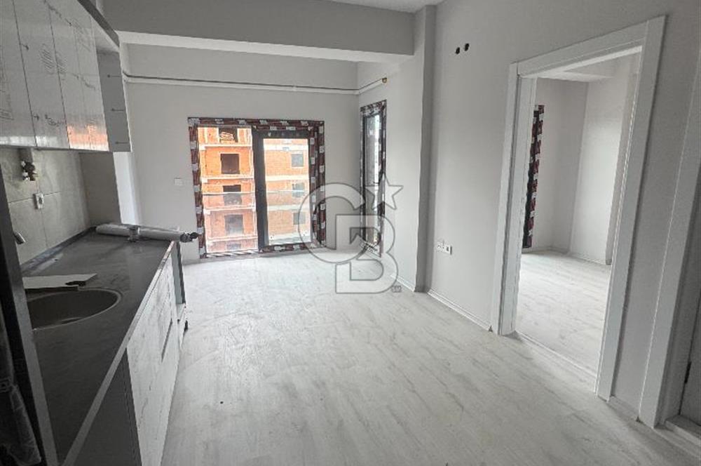 SEYREK MERKEZ'DE KONUMDA 1+1 SATILIK DAİRE