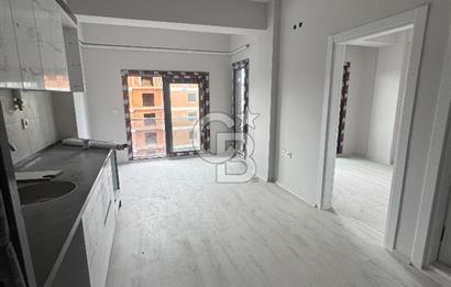 SEYREK MERKEZ'DE KONUMDA 1+1 SATILIK DAİRE