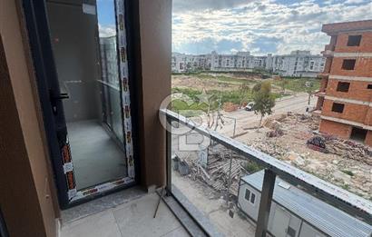 SEYREK MERKEZ'DE KONUMDA 1+1 SATILIK DAİRE