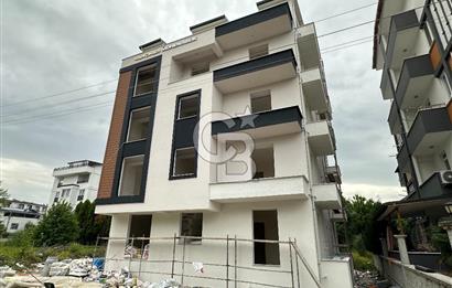 https://www.sahibinden.com/ilan/emlak-konut-satilik-cb-akademi-kartepe-dumlupinar-mah-satilik-2-plus1-ara-kat-daire-1246878393/detay